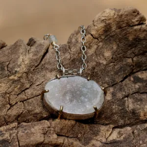 Oval cut lightly coloured raw druzy pendant necklace with silver chain