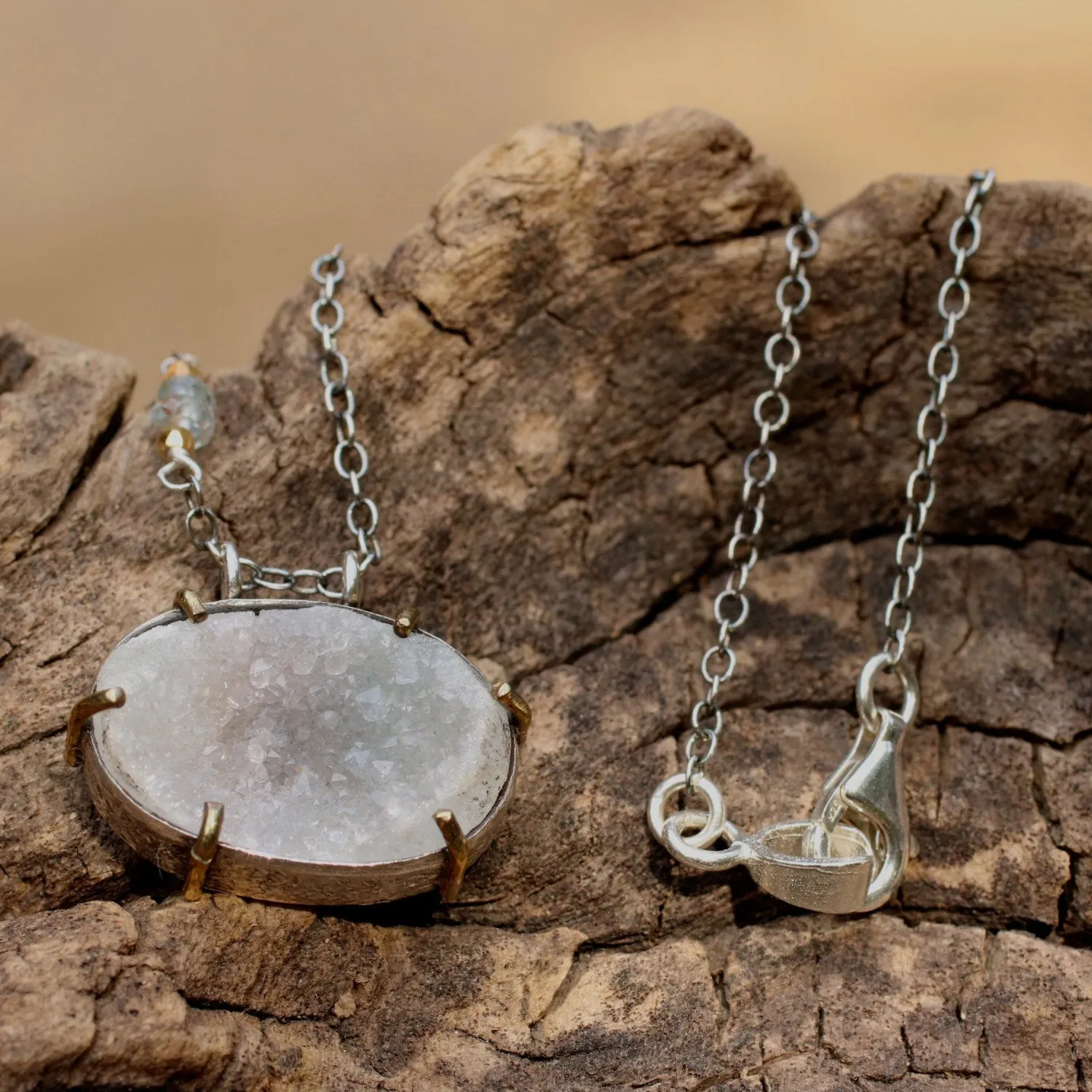 Oval cut lightly coloured raw druzy pendant necklace with silver chain