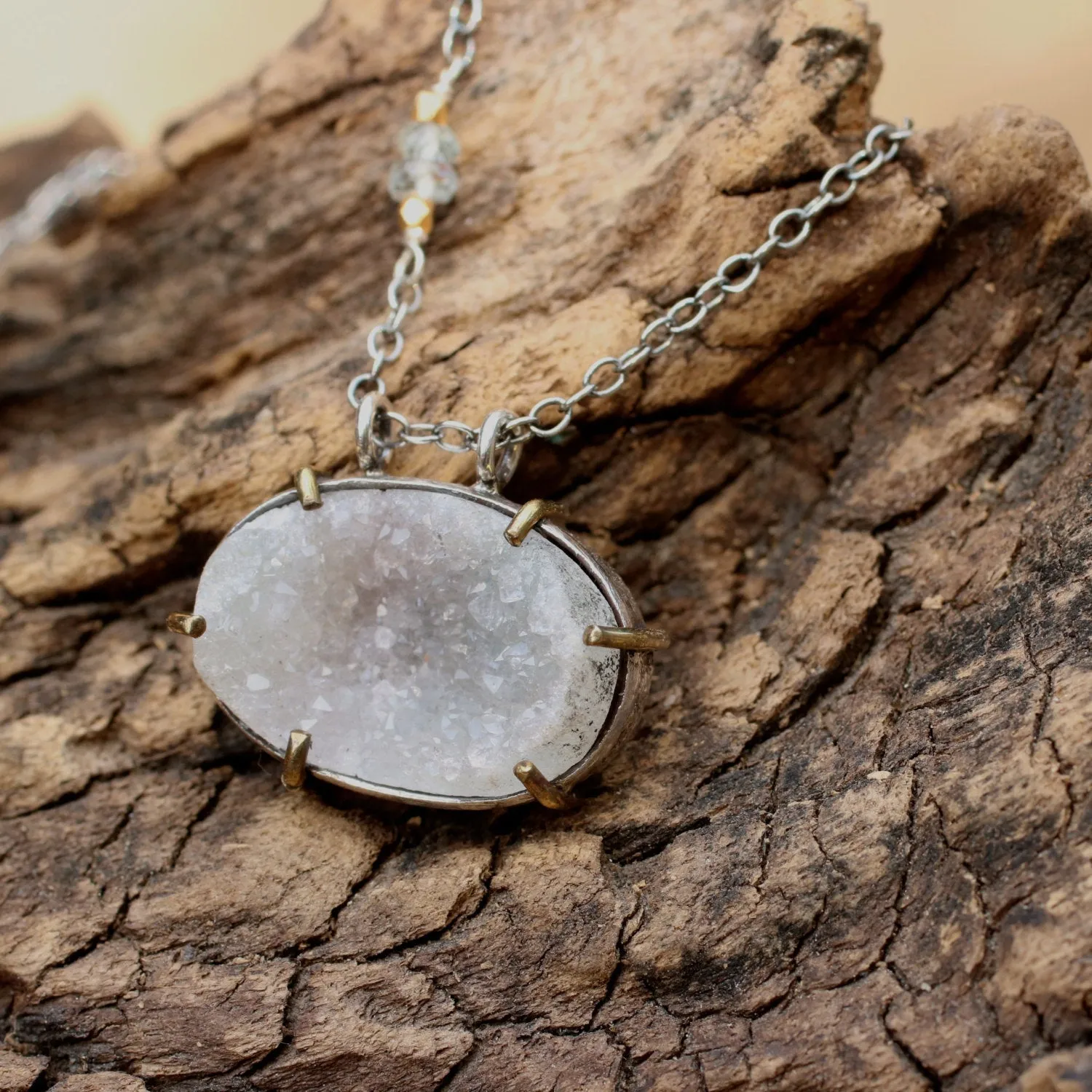 Oval cut lightly coloured raw druzy pendant necklace with silver chain